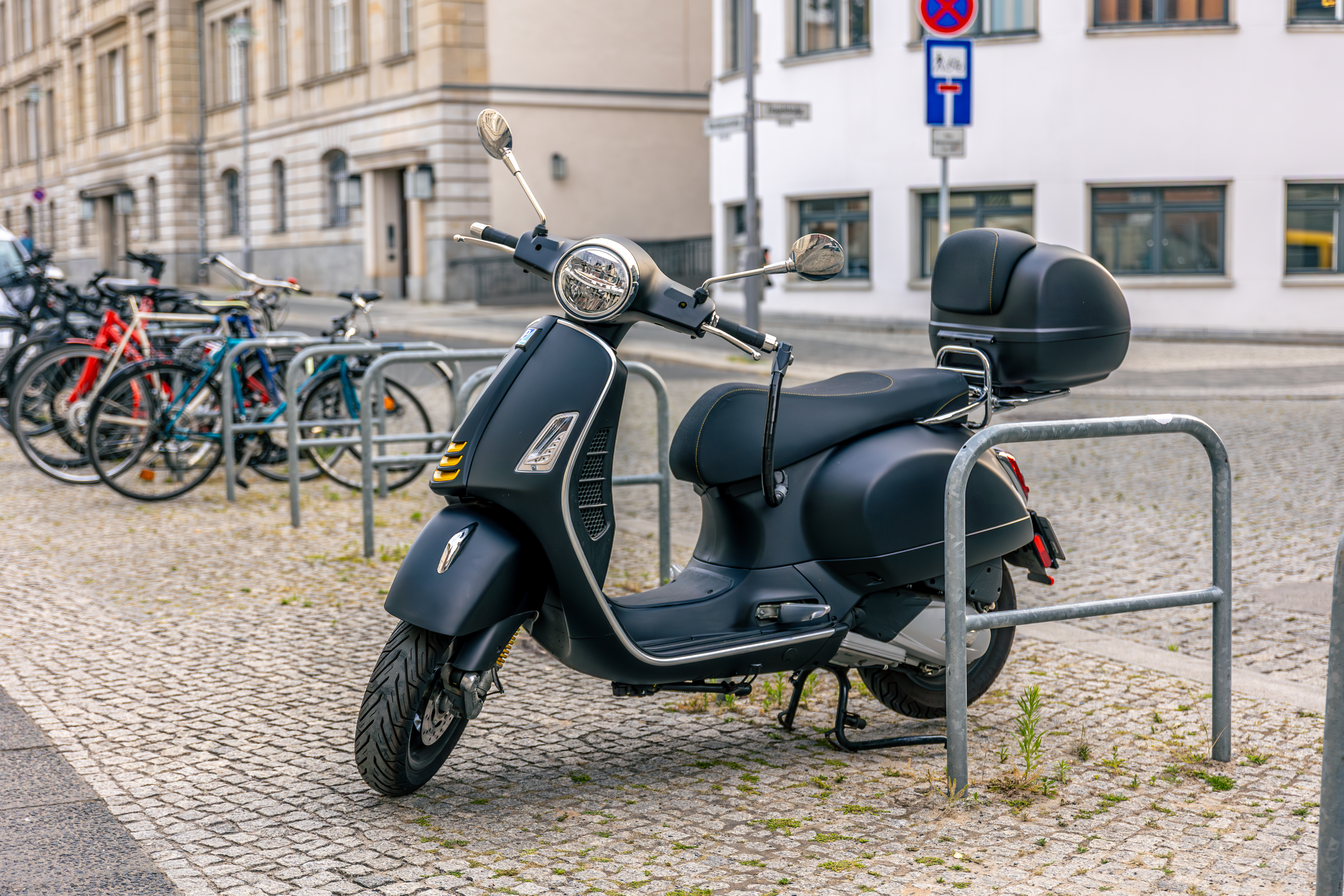 scooter-parked-urban-street-sustainable-transport-eco-mobility.jpg